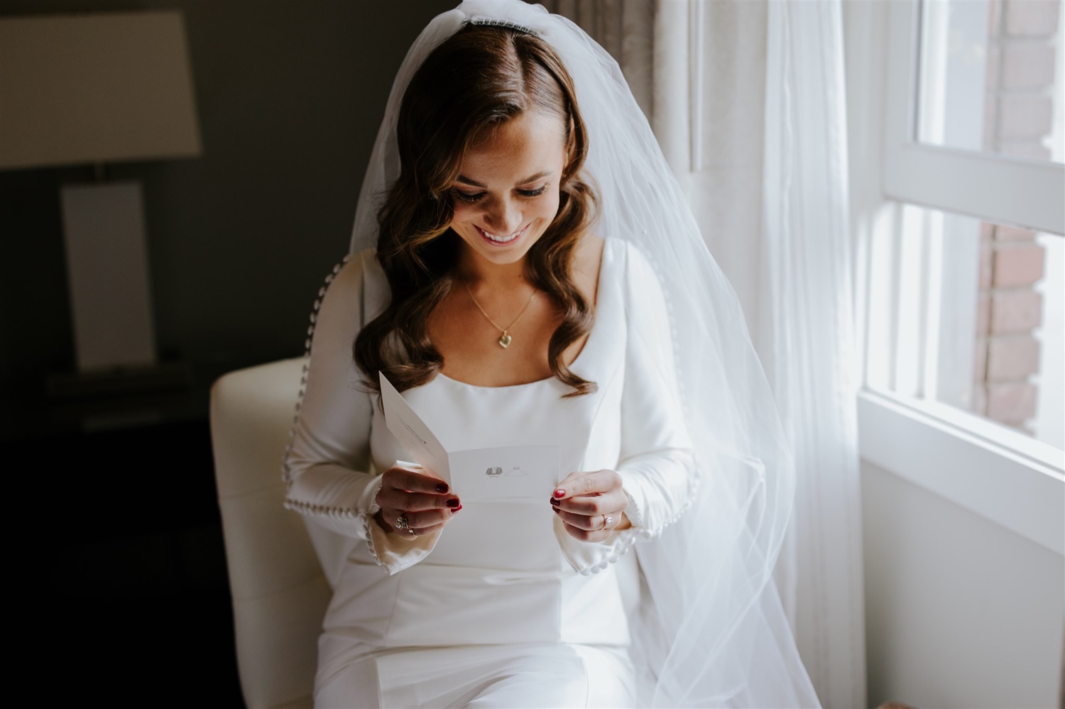 reading letters on wedding day