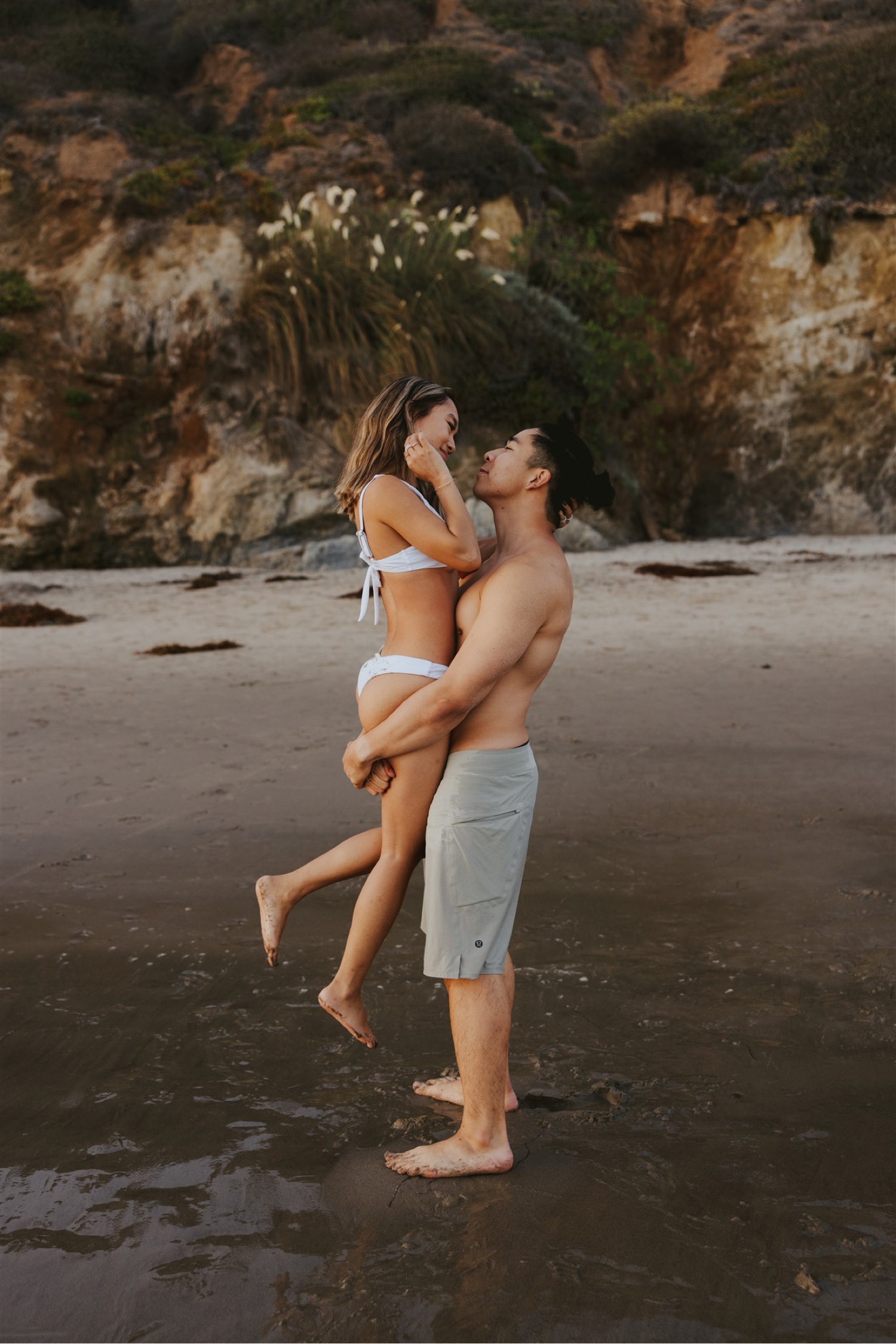 engagement photo outfit ideas; swimwear engagement session