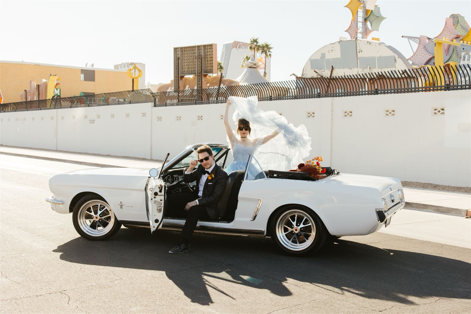 couple in classic car during Las Vegas elopement photos