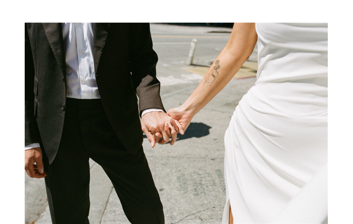 couples wedding portraits walking around Downtown Los Angeles