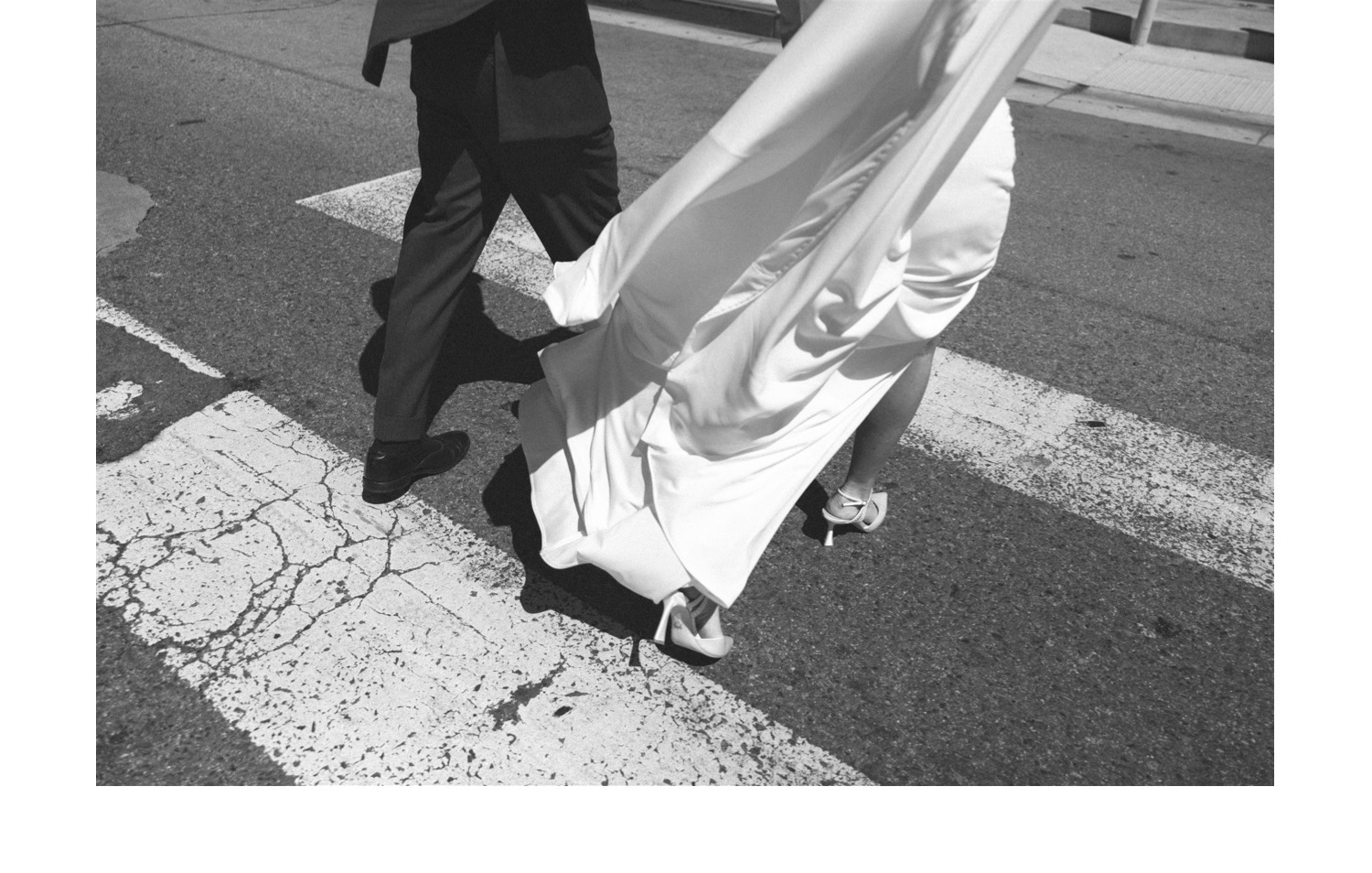 downtown city crosswalk wedding photos