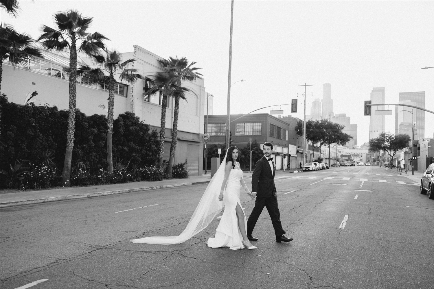 newlywed couples portraits taken during golden hour in Downtown Los Angeles