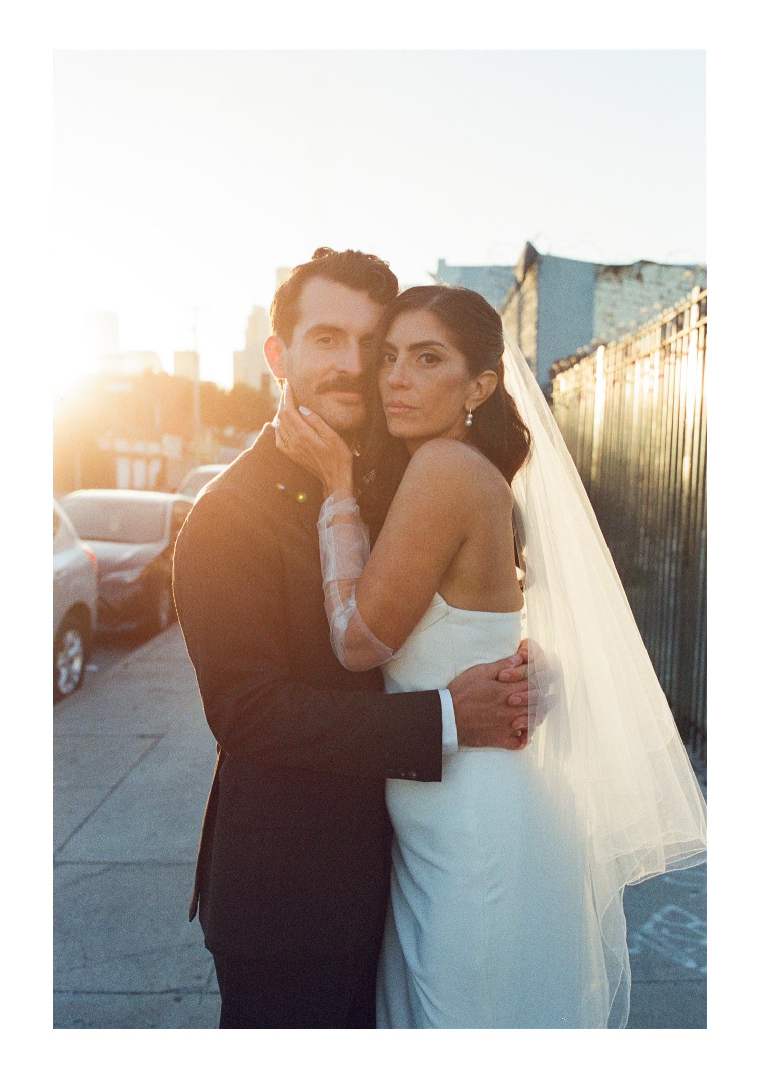 newlywed couples portraits taken during golden hour in Downtown Los Angeles
