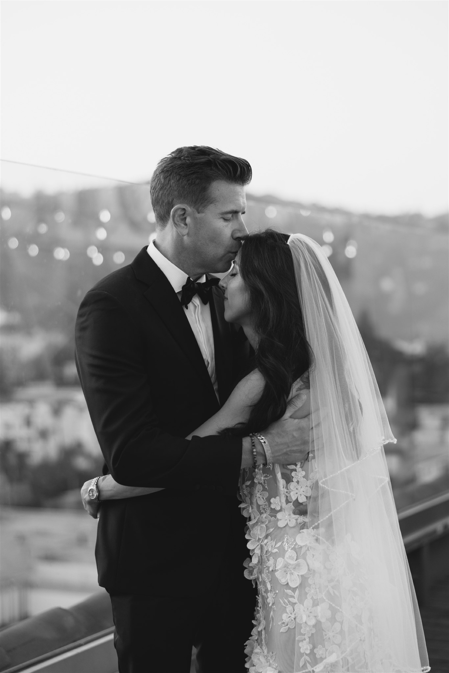 newlywed portraits black and white at sunset