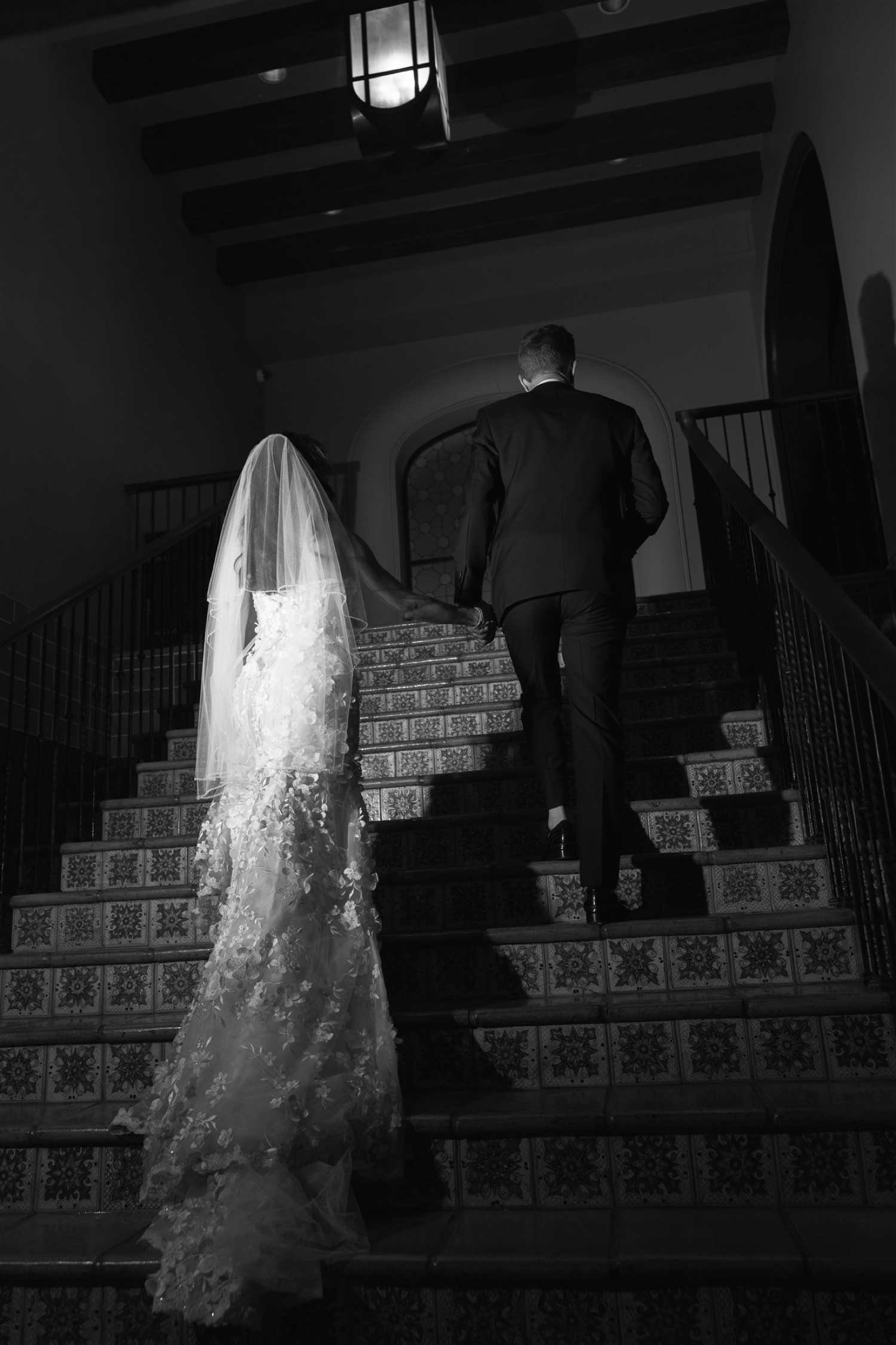 black and white wedding portraits with direct flash; historic stairs at The Hollywood Roosevelt