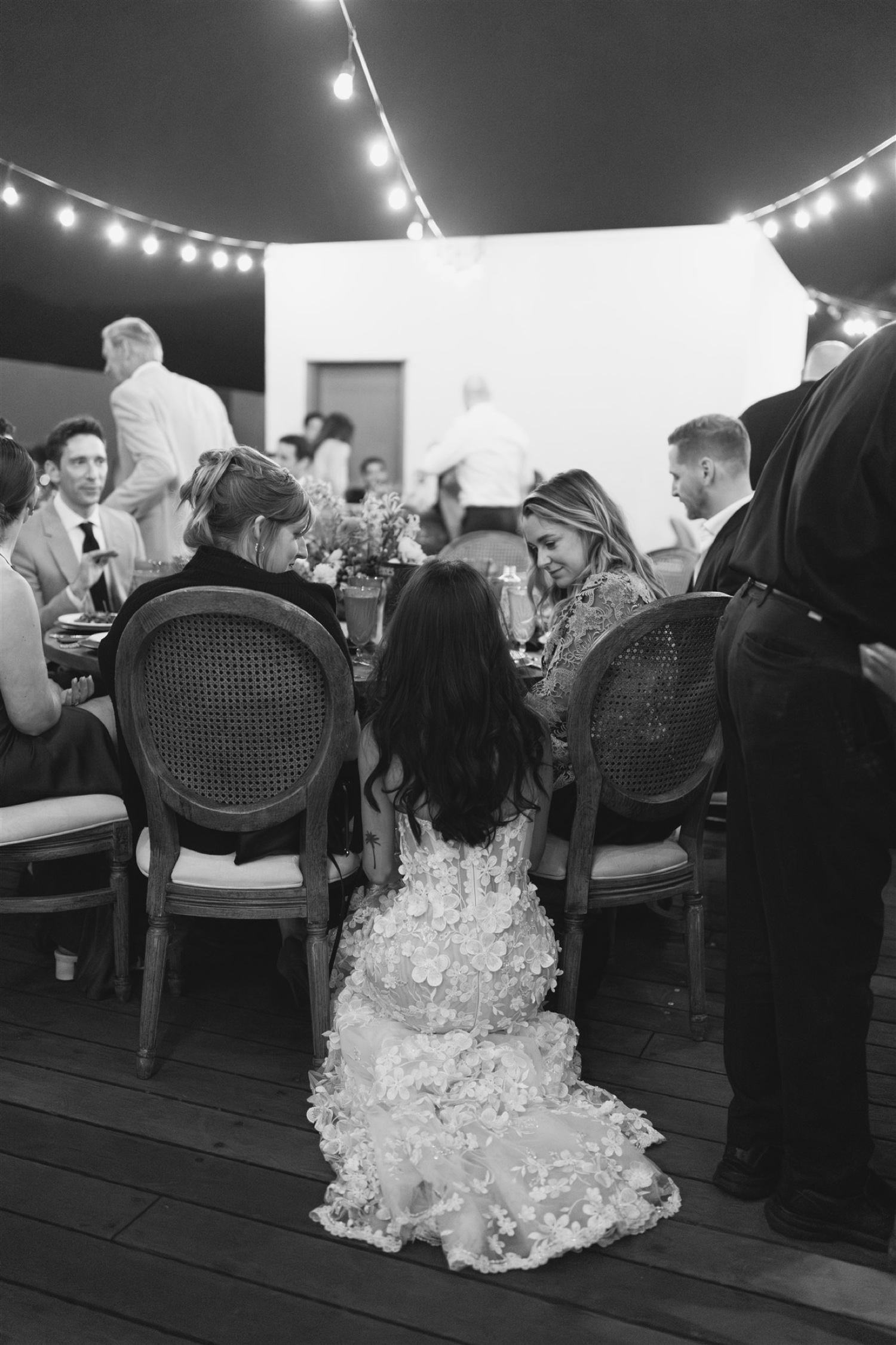 cute photos of bride talking to guests at wedding reception