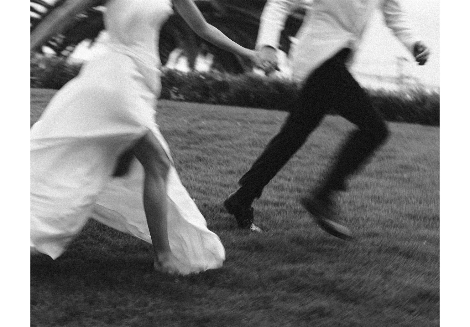 motion blur wedding photography; bride and groom running